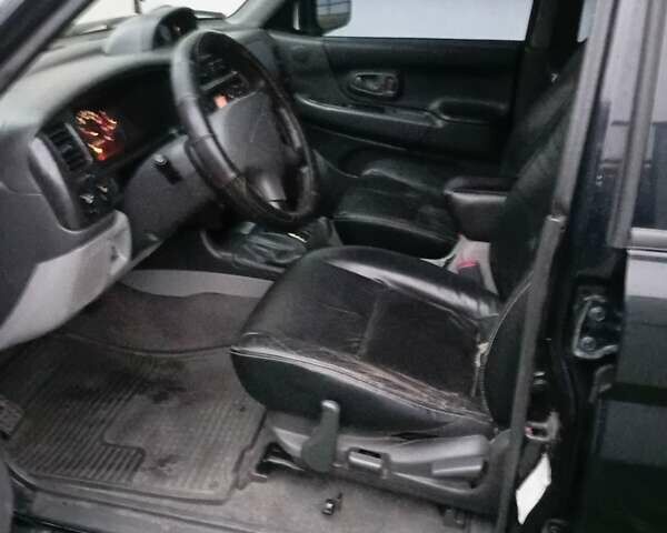 Чорний Міцубісі Паджеро Спорт, об'ємом двигуна 2.97 л та пробігом 230 тис. км за 9500 $, фото 12 на Automoto.ua