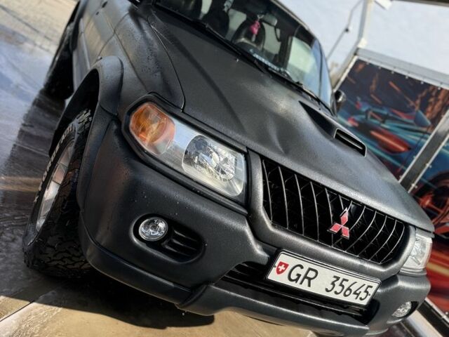 Чорний Міцубісі Паджеро Спорт, об'ємом двигуна 2.5 л та пробігом 3 тис. км за 7000 $, фото 7 на Automoto.ua