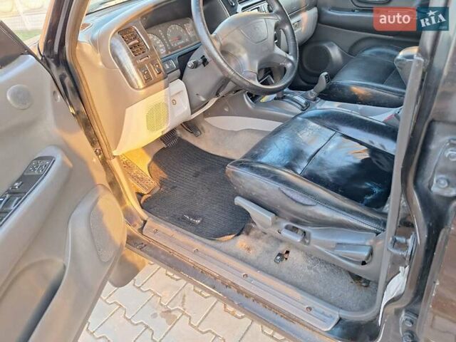 Чорний Міцубісі Паджеро Спорт, об'ємом двигуна 3 л та пробігом 417 тис. км за 6500 $, фото 41 на Automoto.ua