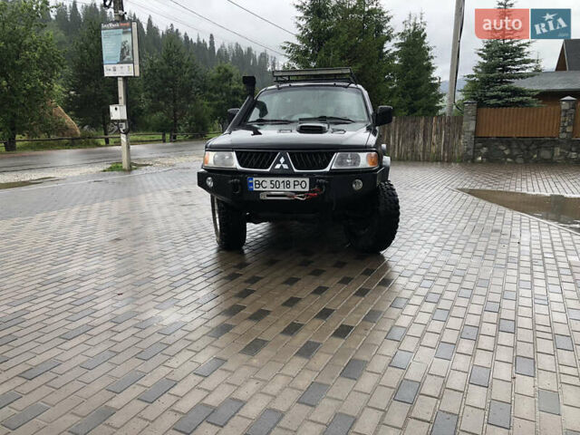 Черный Мицубиси Паджеро Спорт, объемом двигателя 2.48 л и пробегом 227 тыс. км за 9999 $, фото 2 на Automoto.ua