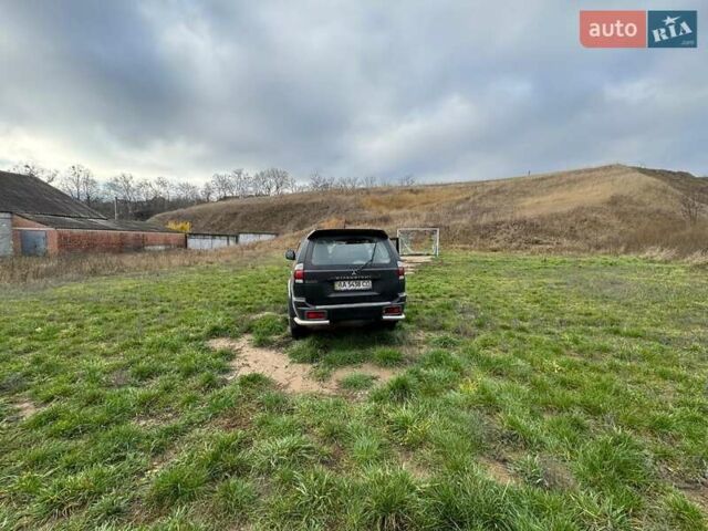 Черный Мицубиси Паджеро Спорт, объемом двигателя 3 л и пробегом 180 тыс. км за 8600 $, фото 2 на Automoto.ua