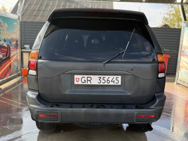 Чорний Міцубісі Паджеро Спорт, об'ємом двигуна 2.5 л та пробігом 3 тис. км за 7000 $, фото 6 на Automoto.ua