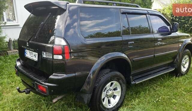 Чорний Міцубісі Паджеро Спорт, об'ємом двигуна 2.97 л та пробігом 195 тис. км за 9400 $, фото 9 на Automoto.ua