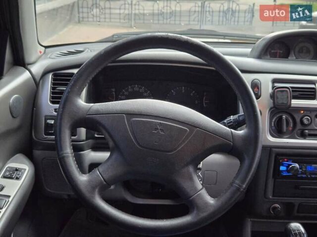 Чорний Міцубісі Паджеро Спорт, об'ємом двигуна 2.5 л та пробігом 345 тис. км за 9900 $, фото 19 на Automoto.ua