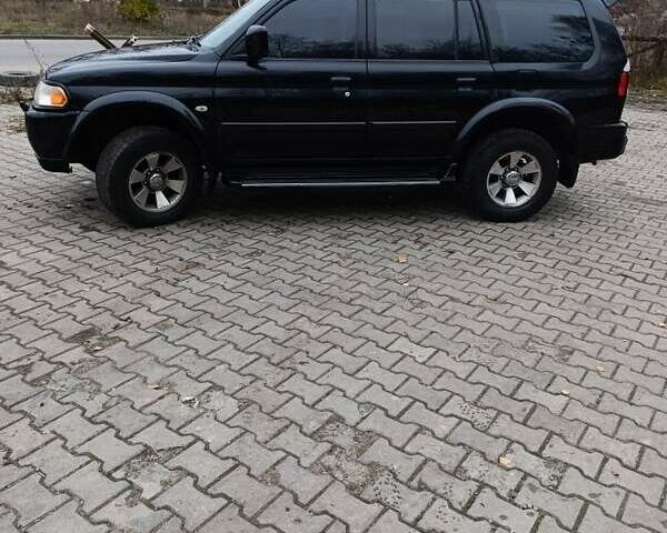 Чорний Міцубісі Паджеро Спорт, об'ємом двигуна 3 л та пробігом 238 тис. км за 8500 $, фото 7 на Automoto.ua