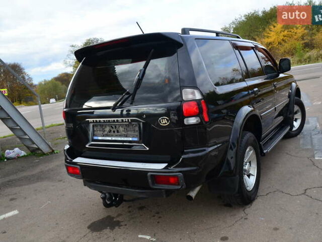 Мицубиси Паджеро Спорт 2007 в Дрогобыче на Automoto.ua Черный Мицубиси Паджеро Спорт, объемом двигателя 2.5 л и пробегом 200 тыс. км за 9950 $, фото 31 на Automoto.ua