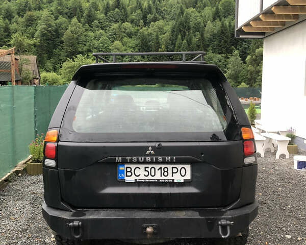 Черный Мицубиси Паджеро Спорт, объемом двигателя 2.48 л и пробегом 227 тыс. км за 9999 $, фото 4 на Automoto.ua