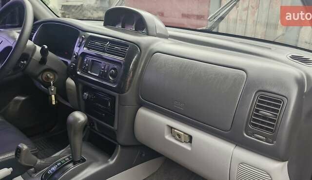 Чорний Міцубісі Паджеро Спорт, об'ємом двигуна 2.97 л та пробігом 195 тис. км за 9400 $, фото 2 на Automoto.ua