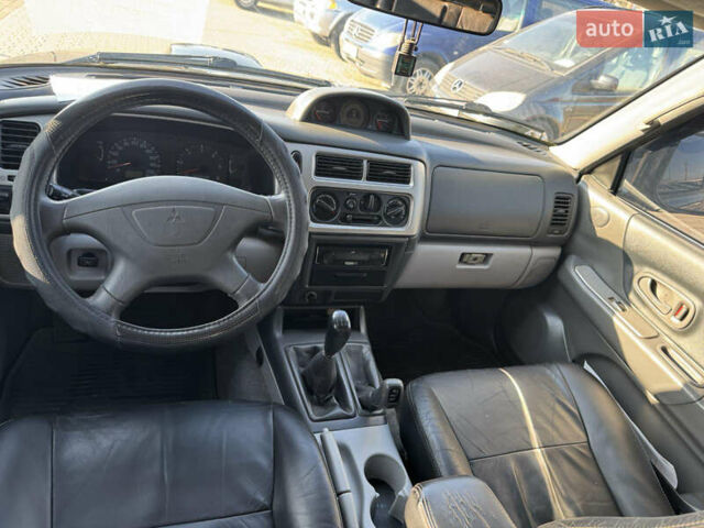 Черный Мицубиси Паджеро Спорт, объемом двигателя 2.48 л и пробегом 163 тыс. км за 10500 $, фото 6 на Automoto.ua