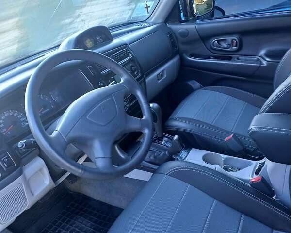 Чорний Міцубісі Паджеро Спорт, об'ємом двигуна 3.01 л та пробігом 310 тис. км за 8300 $, фото 12 на Automoto.ua