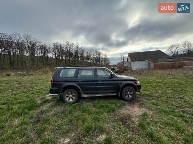 Черный Мицубиси Паджеро Спорт, объемом двигателя 3 л и пробегом 180 тыс. км за 8600 $, фото 3 на Automoto.ua