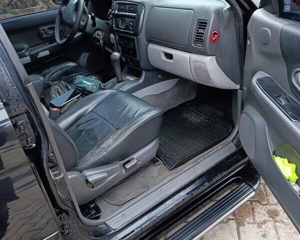 Чорний Міцубісі Паджеро Спорт, об'ємом двигуна 3 л та пробігом 238 тис. км за 8500 $, фото 5 на Automoto.ua