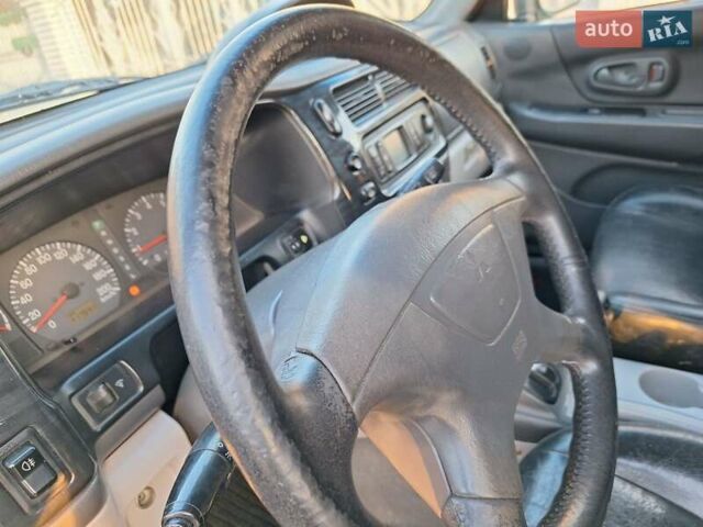 Чорний Міцубісі Паджеро Спорт, об'ємом двигуна 3 л та пробігом 417 тис. км за 6500 $, фото 45 на Automoto.ua
