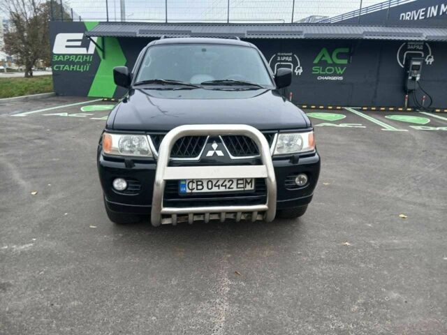 Чорний Міцубісі Паджеро Спорт, об'ємом двигуна 3 л та пробігом 200 тис. км за 8300 $, фото 2 на Automoto.ua