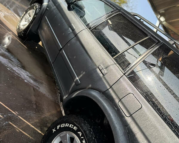 Чорний Міцубісі Паджеро Спорт, об'ємом двигуна 2.5 л та пробігом 330 тис. км за 7000 $, фото 2 на Automoto.ua