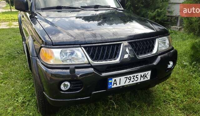 Чорний Міцубісі Паджеро Спорт, об'ємом двигуна 2.97 л та пробігом 195 тис. км за 9400 $, фото 8 на Automoto.ua
