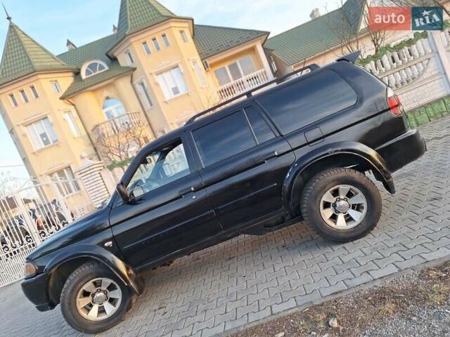 Чорний Міцубісі Паджеро Спорт, об'ємом двигуна 3 л та пробігом 417 тис. км за 6500 $, фото 53 на Automoto.ua