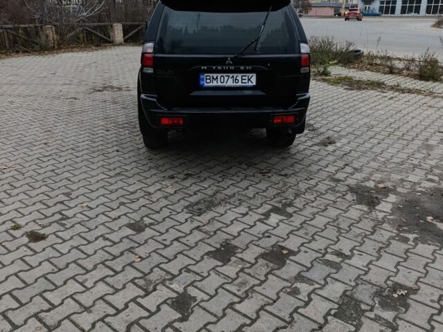 Чорний Міцубісі Паджеро Спорт, об'ємом двигуна 3 л та пробігом 238 тис. км за 8500 $, фото 1 на Automoto.ua