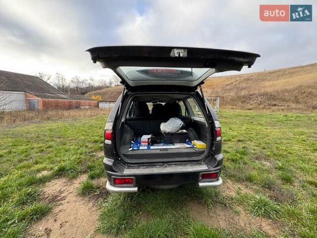 Черный Мицубиси Паджеро Спорт, объемом двигателя 3 л и пробегом 180 тыс. км за 8600 $, фото 5 на Automoto.ua