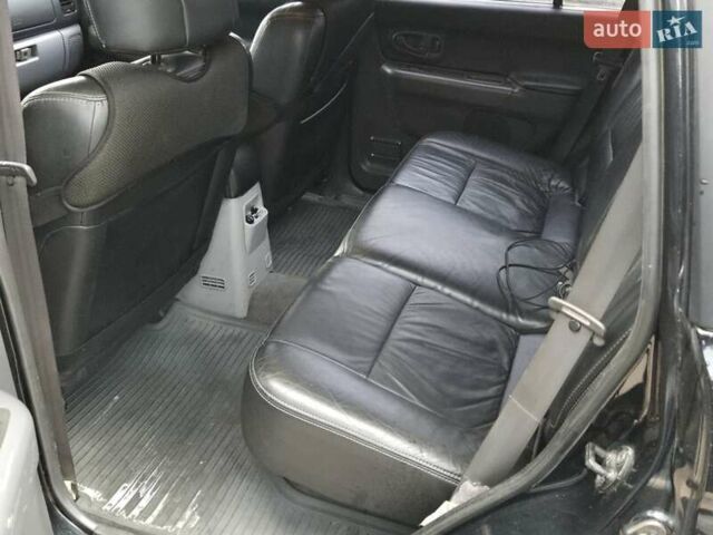 Чорний Міцубісі Паджеро Спорт, об'ємом двигуна 2.5 л та пробігом 345 тис. км за 9900 $, фото 11 на Automoto.ua