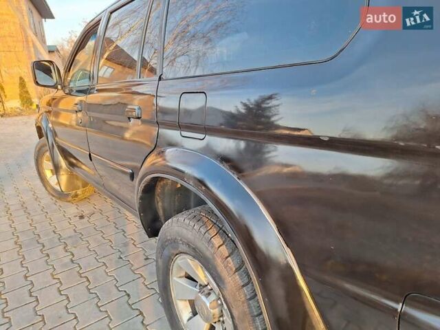 Чорний Міцубісі Паджеро Спорт, об'ємом двигуна 3 л та пробігом 417 тис. км за 6500 $, фото 24 на Automoto.ua