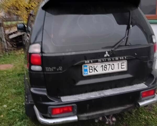 Чорний Міцубісі Паджеро Спорт, об'ємом двигуна 2.97 л та пробігом 230 тис. км за 9500 $, фото 9 на Automoto.ua