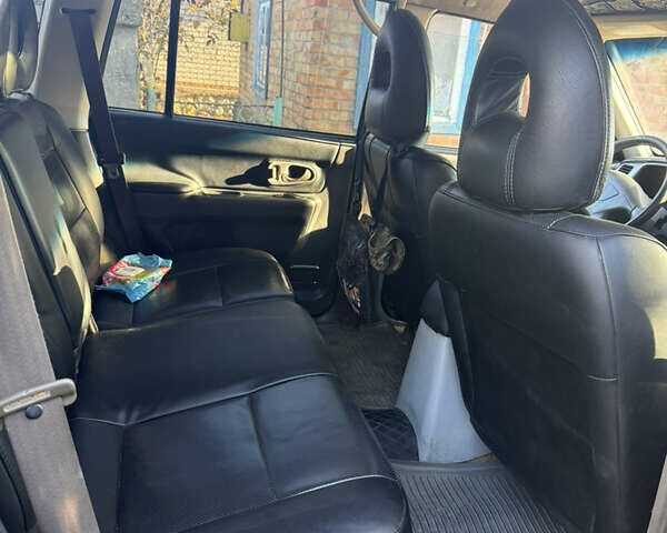 Чорний Міцубісі Паджеро Спорт, об'ємом двигуна 2.5 л та пробігом 330 тис. км за 7000 $, фото 7 на Automoto.ua