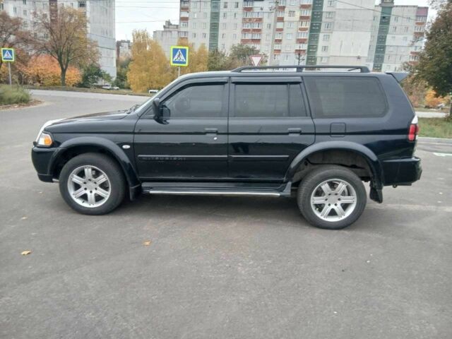 Чорний Міцубісі Паджеро Спорт, об'ємом двигуна 3 л та пробігом 200 тис. км за 8300 $, фото 6 на Automoto.ua