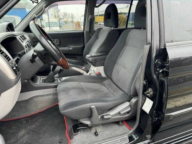 Чорний Міцубісі Паджеро Спорт, об'ємом двигуна 2.5 л та пробігом 248 тис. км за 4100 $, фото 5 на Automoto.ua