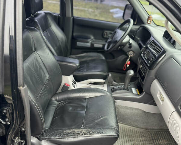 Черный Мицубиси Паджеро Спорт, объемом двигателя 3 л и пробегом 240 тыс. км за 8500 $, фото 9 на Automoto.ua