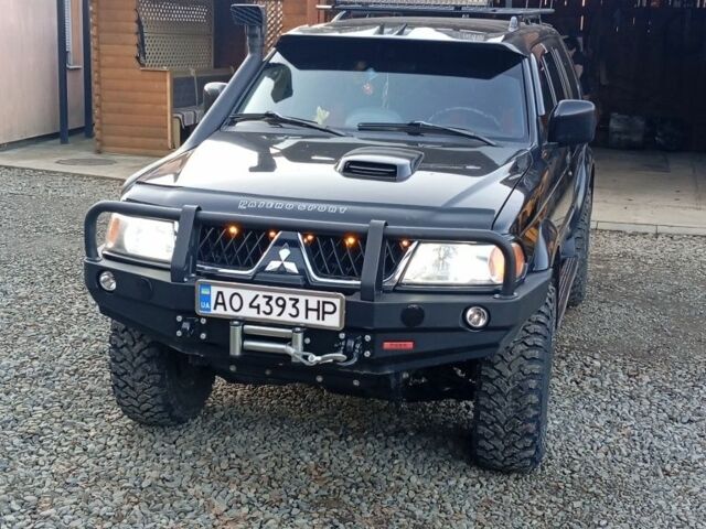 Чорний Міцубісі Паджеро Спорт, об'ємом двигуна 2.5 л та пробігом 279 тис. км за 13000 $, фото 3 на Automoto.ua