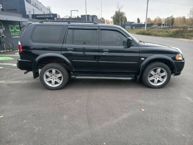 Чорний Міцубісі Паджеро Спорт, об'ємом двигуна 3 л та пробігом 200 тис. км за 8300 $, фото 5 на Automoto.ua