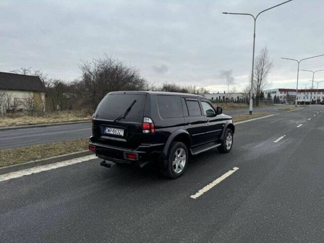 Чорний Міцубісі Паджеро Спорт, об'ємом двигуна 2.5 л та пробігом 248 тис. км за 4100 $, фото 3 на Automoto.ua