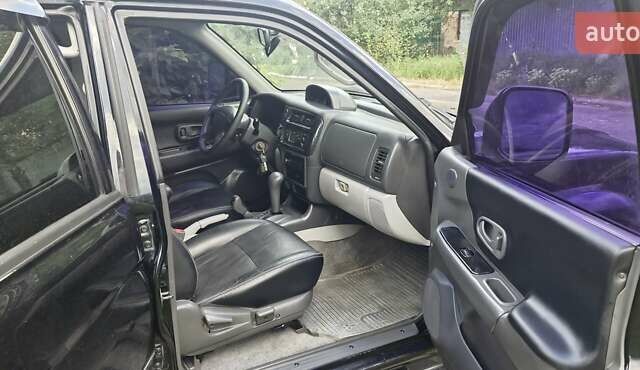 Чорний Міцубісі Паджеро Спорт, об'ємом двигуна 2.97 л та пробігом 195 тис. км за 9400 $, фото 4 на Automoto.ua