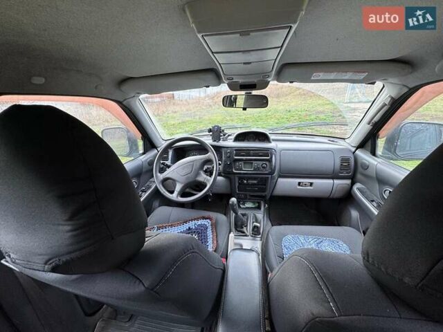 Черный Мицубиси Паджеро Спорт, объемом двигателя 3 л и пробегом 180 тыс. км за 8600 $, фото 6 на Automoto.ua