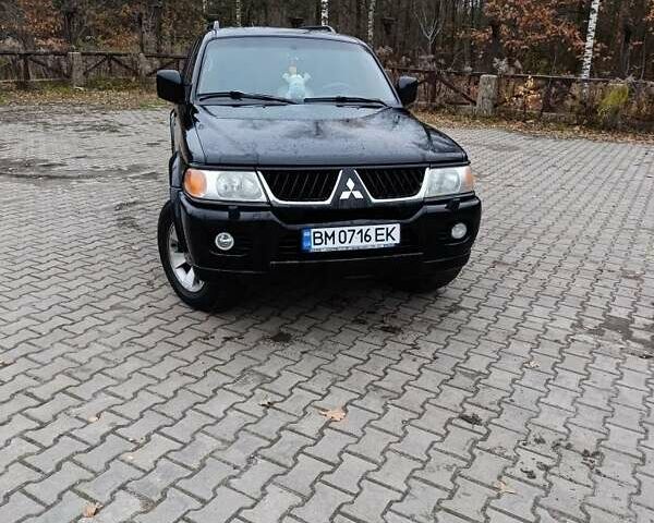 Чорний Міцубісі Паджеро Спорт, об'ємом двигуна 3 л та пробігом 238 тис. км за 8500 $, фото 2 на Automoto.ua