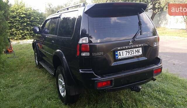 Чорний Міцубісі Паджеро Спорт, об'ємом двигуна 2.97 л та пробігом 195 тис. км за 9400 $, фото 11 на Automoto.ua