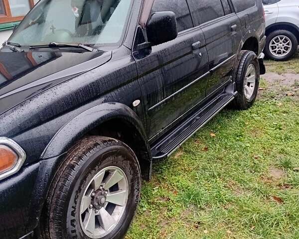 Чорний Міцубісі Паджеро Спорт, об'ємом двигуна 2.97 л та пробігом 230 тис. км за 9500 $, фото 11 на Automoto.ua