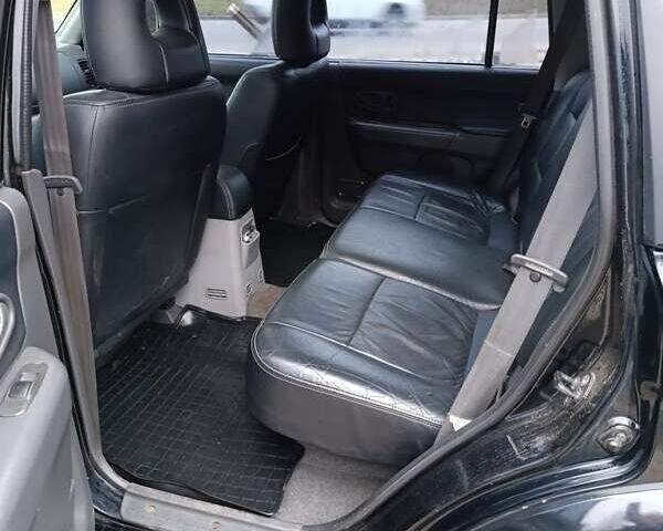 Чорний Міцубісі Паджеро Спорт, об'ємом двигуна 3 л та пробігом 238 тис. км за 8500 $, фото 3 на Automoto.ua