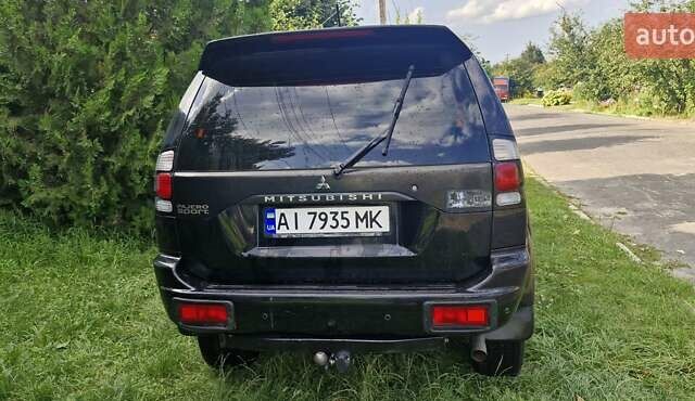 Чорний Міцубісі Паджеро Спорт, об'ємом двигуна 2.97 л та пробігом 195 тис. км за 9400 $, фото 7 на Automoto.ua