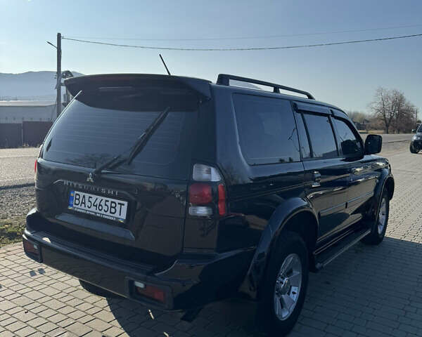 Черный Мицубиси Паджеро Спорт, объемом двигателя 2.48 л и пробегом 163 тыс. км за 10500 $, фото 3 на Automoto.ua