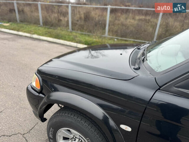 Черный Мицубиси Паджеро Спорт, объемом двигателя 3 л и пробегом 240 тыс. км за 8500 $, фото 6 на Automoto.ua