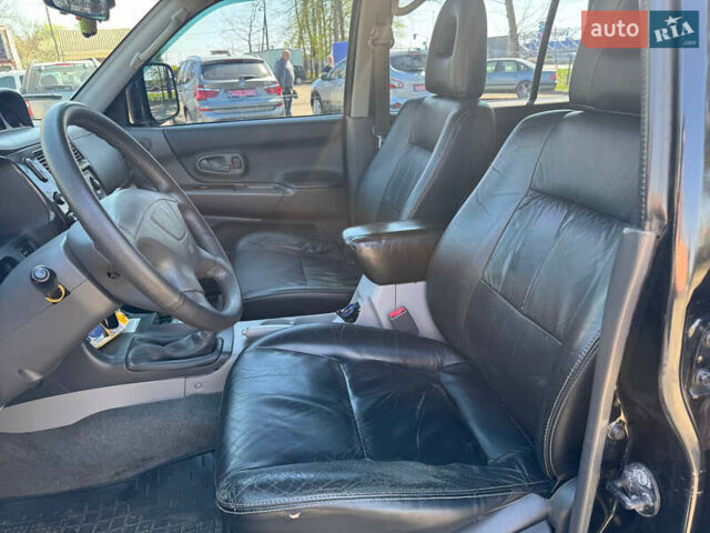 Чорний Міцубісі Паджеро Спорт, об'ємом двигуна 3 л та пробігом 195 тис. км за 8500 $, фото 6 на Automoto.ua