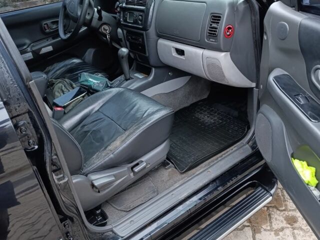 Чорний Міцубісі Паджеро Спорт, об'ємом двигуна 3 л та пробігом 238 тис. км за 8500 $, фото 6 на Automoto.ua