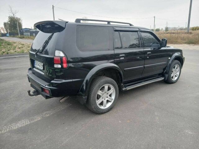 Чорний Міцубісі Паджеро Спорт, об'ємом двигуна 3 л та пробігом 200 тис. км за 8300 $, фото 3 на Automoto.ua