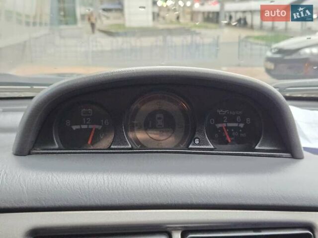 Чорний Міцубісі Паджеро Спорт, об'ємом двигуна 2.5 л та пробігом 345 тис. км за 9900 $, фото 23 на Automoto.ua