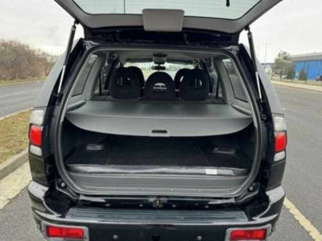 Чорний Міцубісі Паджеро Спорт, об'ємом двигуна 2.5 л та пробігом 248 тис. км за 4100 $, фото 4 на Automoto.ua