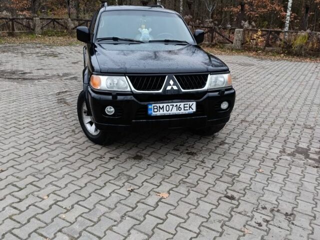 Чорний Міцубісі Паджеро Спорт, об'ємом двигуна 3 л та пробігом 238 тис. км за 8500 $, фото 3 на Automoto.ua