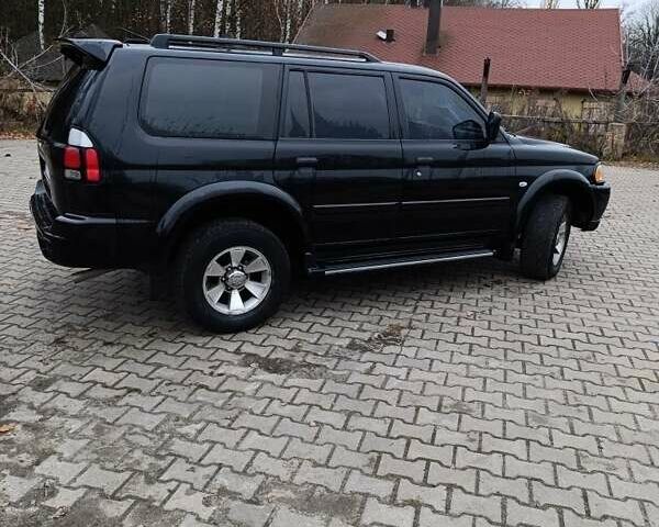 Чорний Міцубісі Паджеро Спорт, об'ємом двигуна 3 л та пробігом 238 тис. км за 8500 $, фото 1 на Automoto.ua