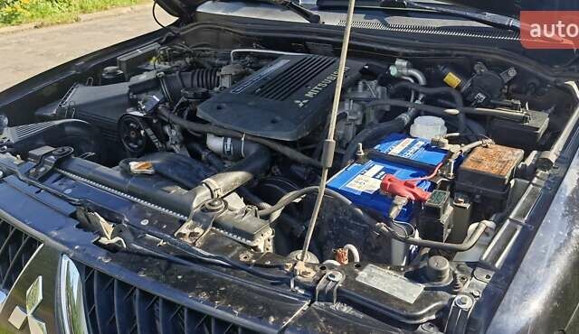 Чорний Міцубісі Паджеро Спорт, об'ємом двигуна 2.97 л та пробігом 195 тис. км за 9400 $, фото 5 на Automoto.ua